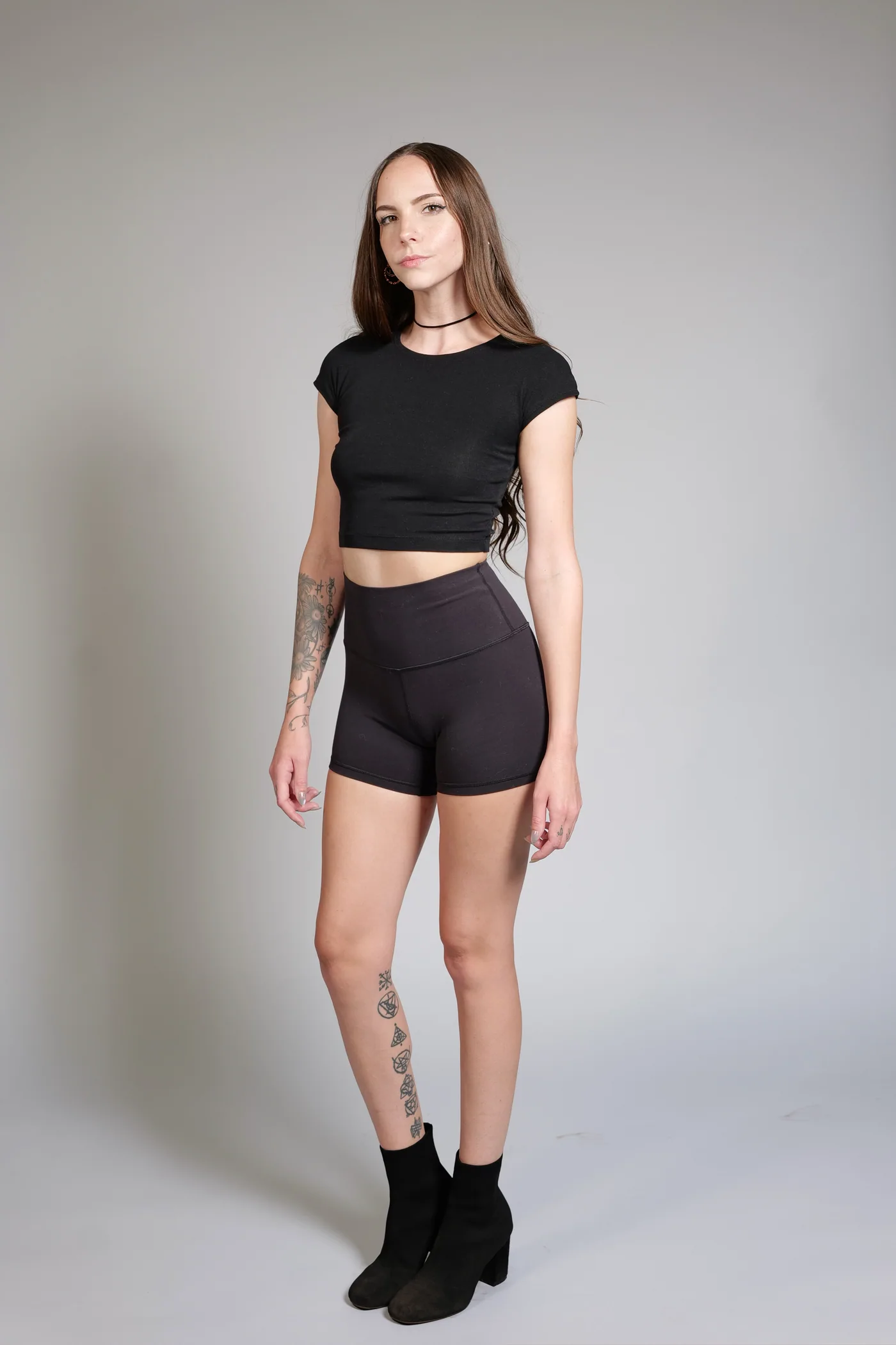 Caitlyn standing facing forward against a neutral background